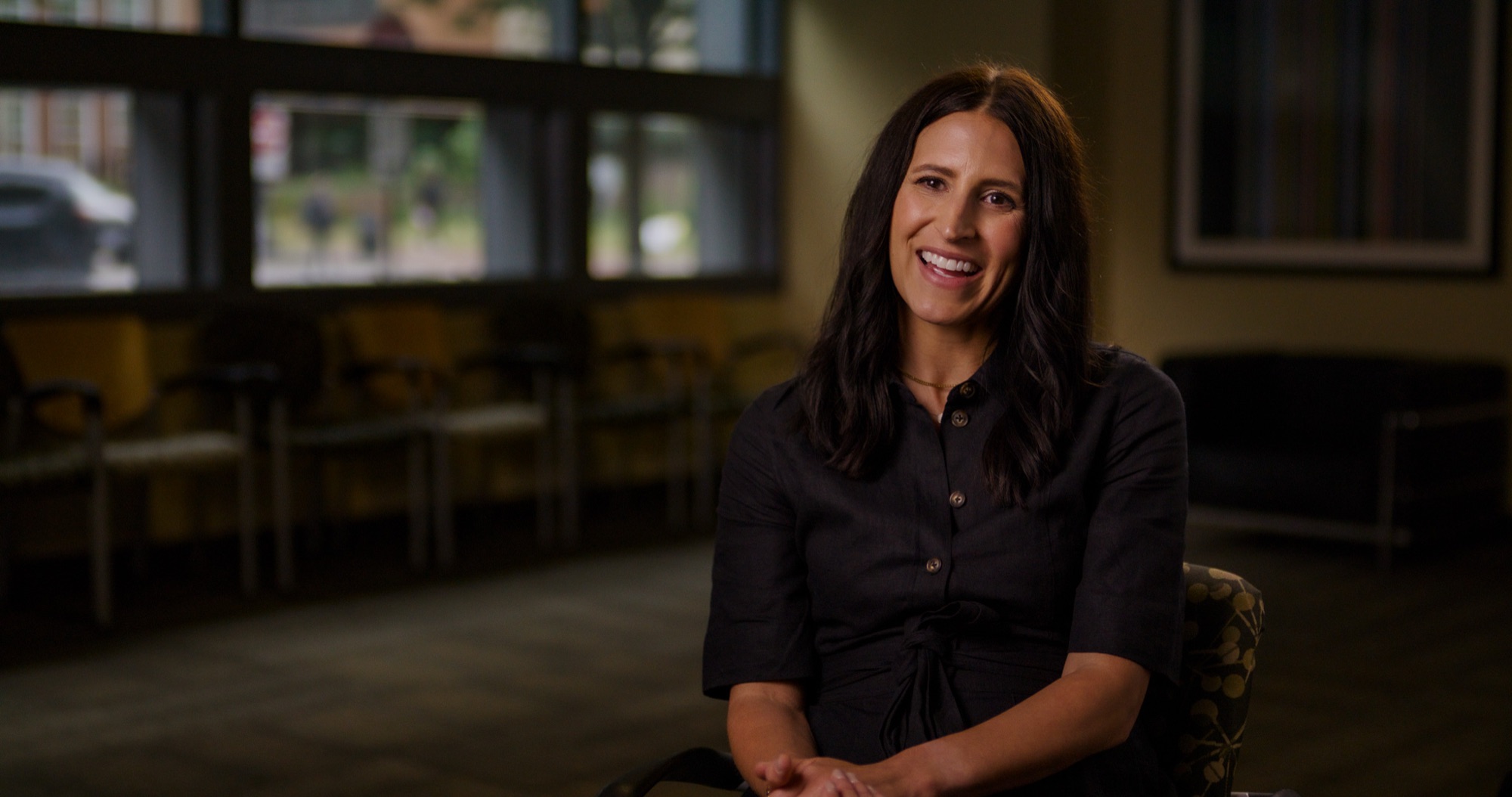 Documentary interview frame — natural window light